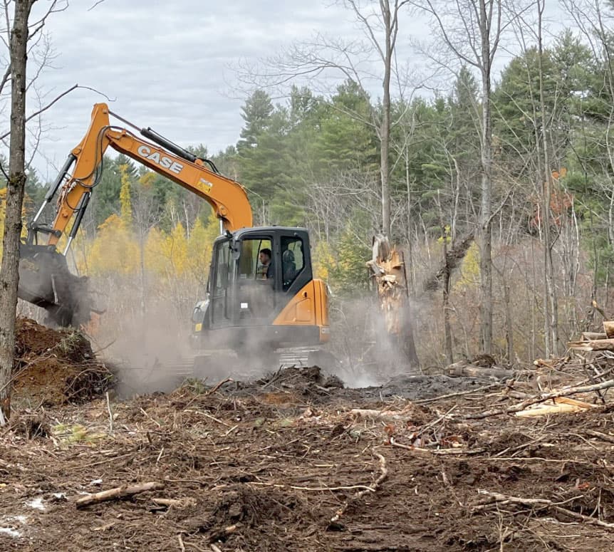 Operator running an excavator on a remote site